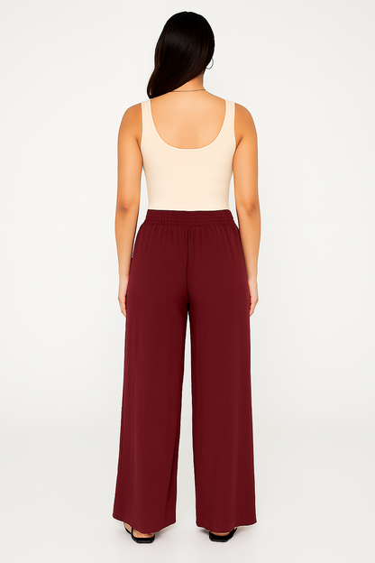 Rayon Maroon Solid Palazzo Pants with Elastic Waistband and Side Pockets